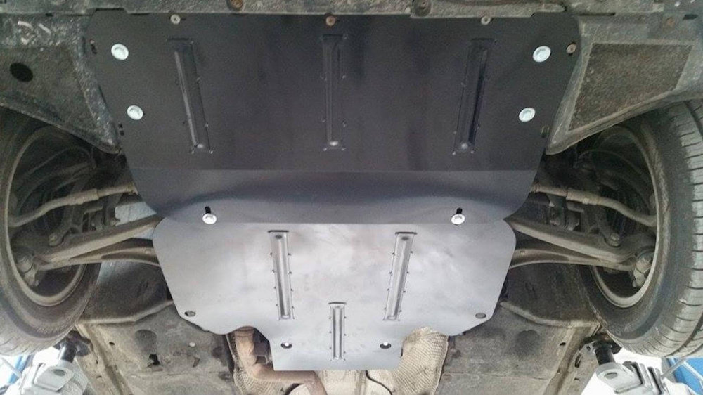 Pohjapanssarin asennus - Audi